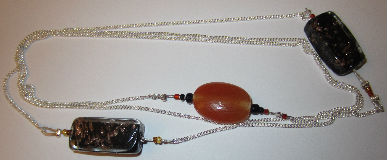 Sautoir Chaine Tigrou perle en verre opaque et doré Sobij-unik